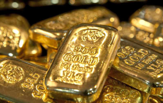 Lingotes de oro 999 apiladas