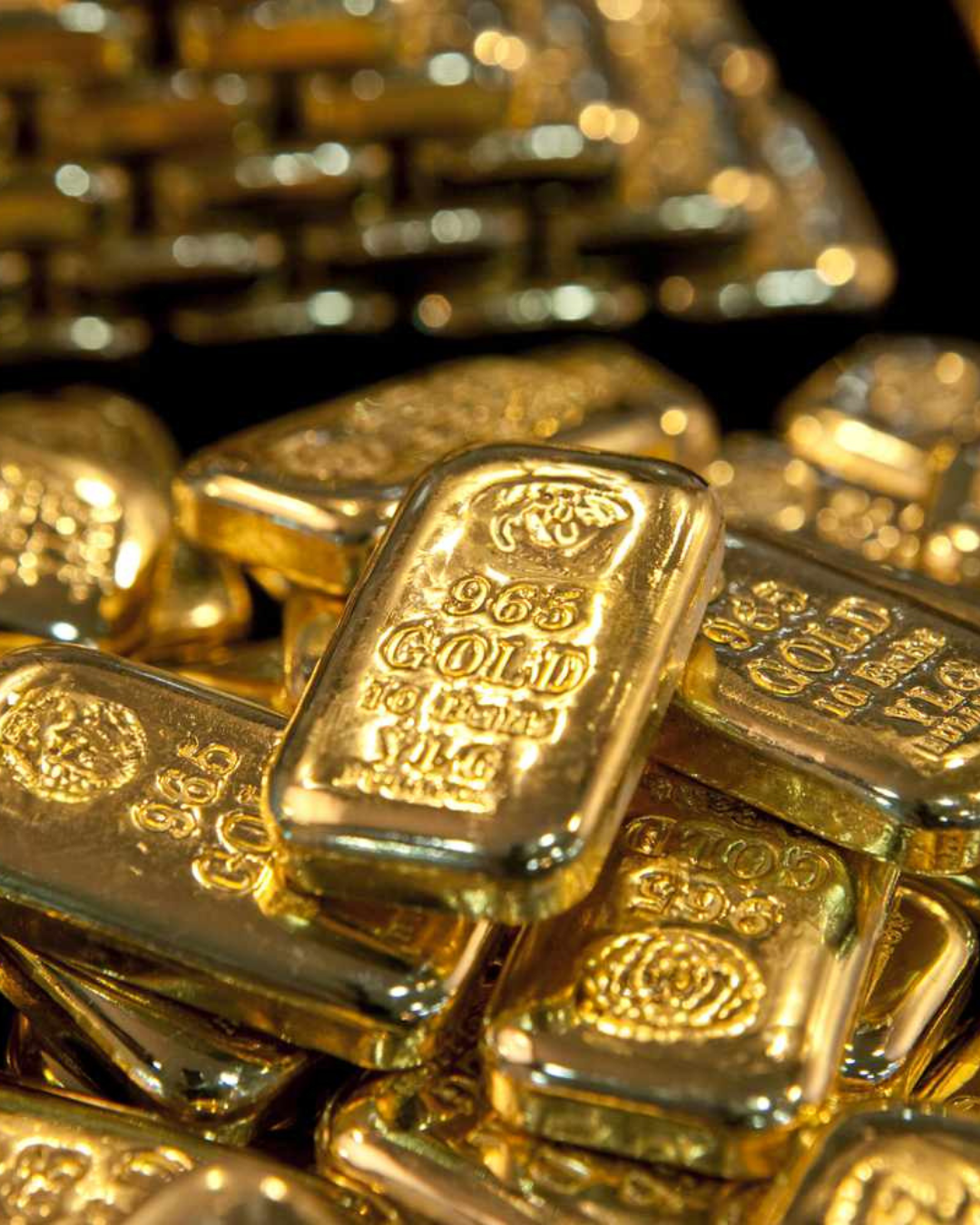 Lingotes de oro 999 apiladas